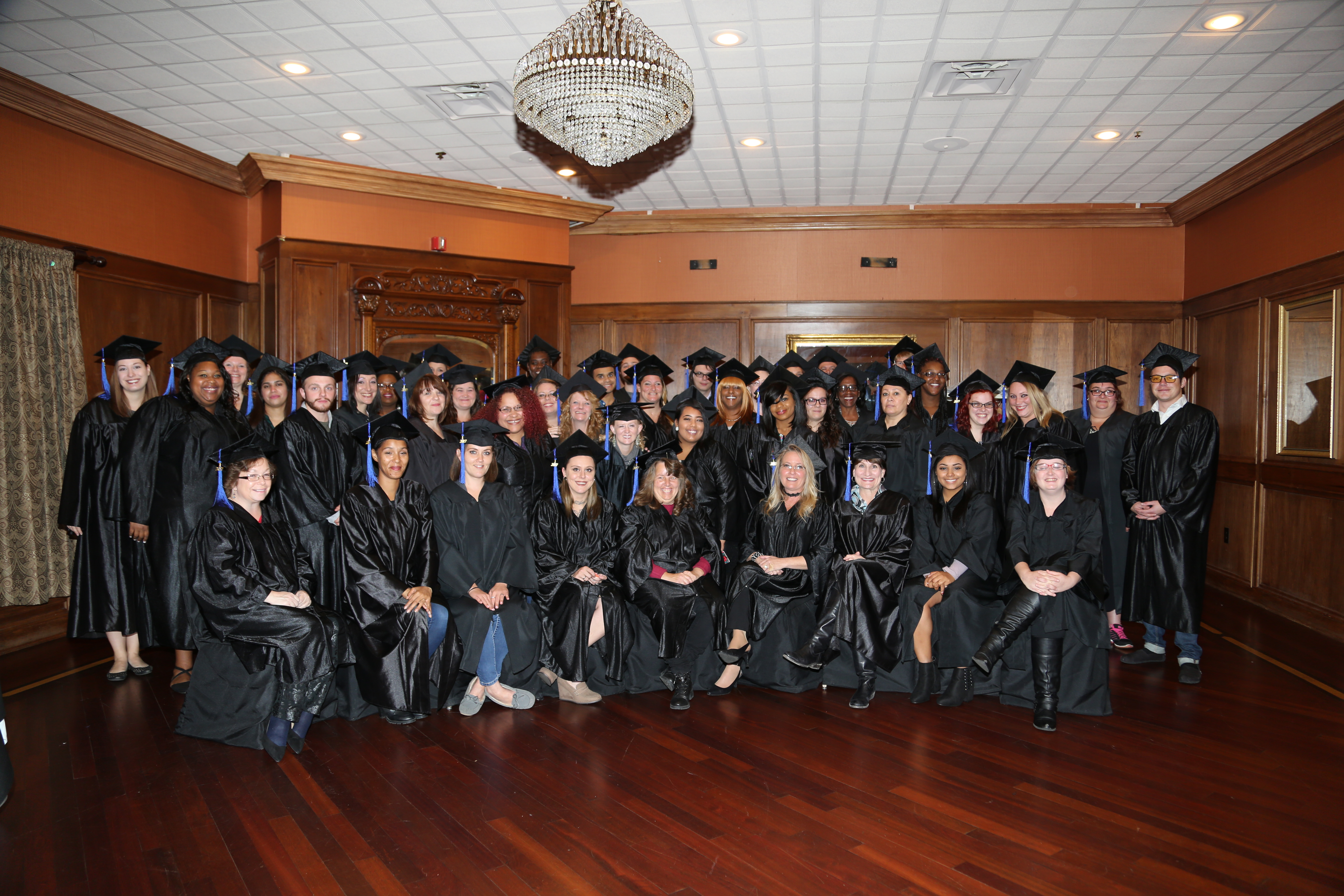 Group photo of trainees at CET graduation ceremony.